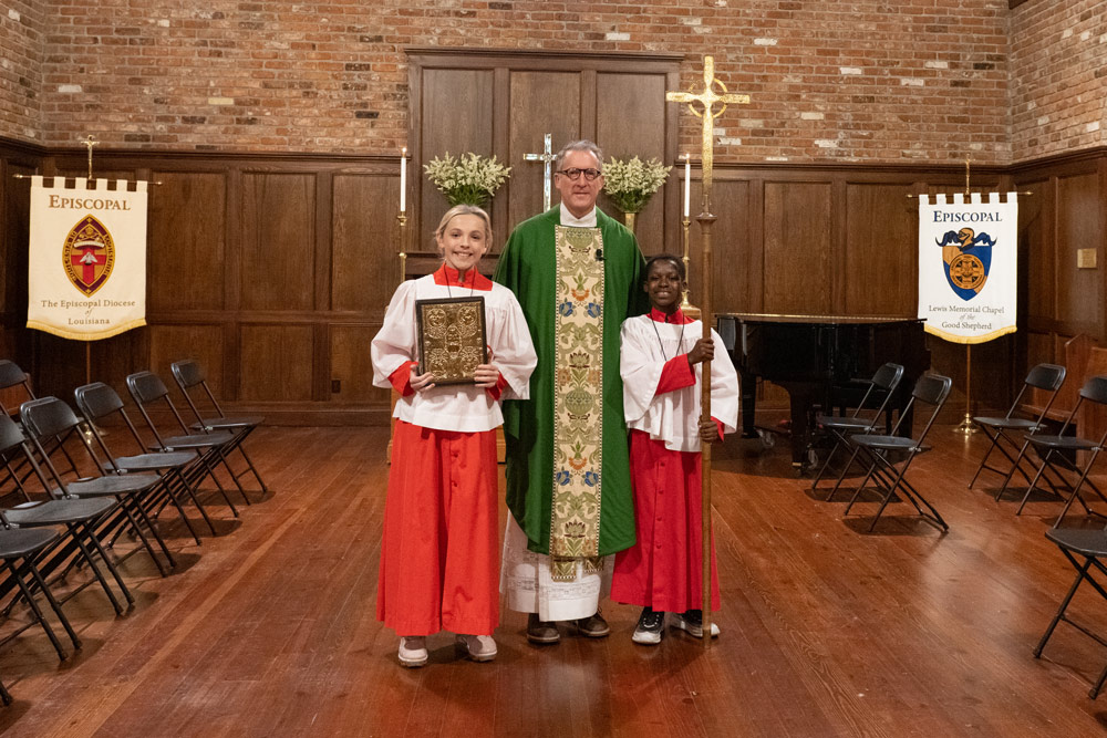 Middle School students and Father Skully Knight in Chapel