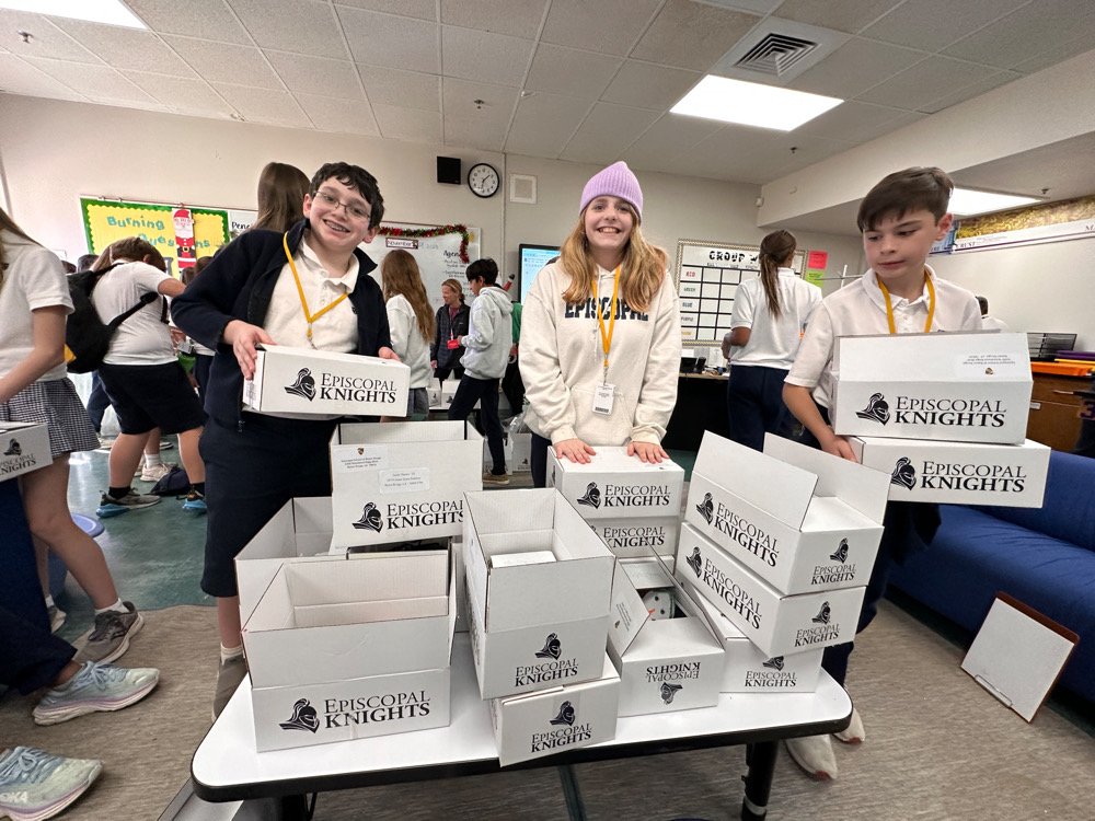 Middle School students boxing care packages