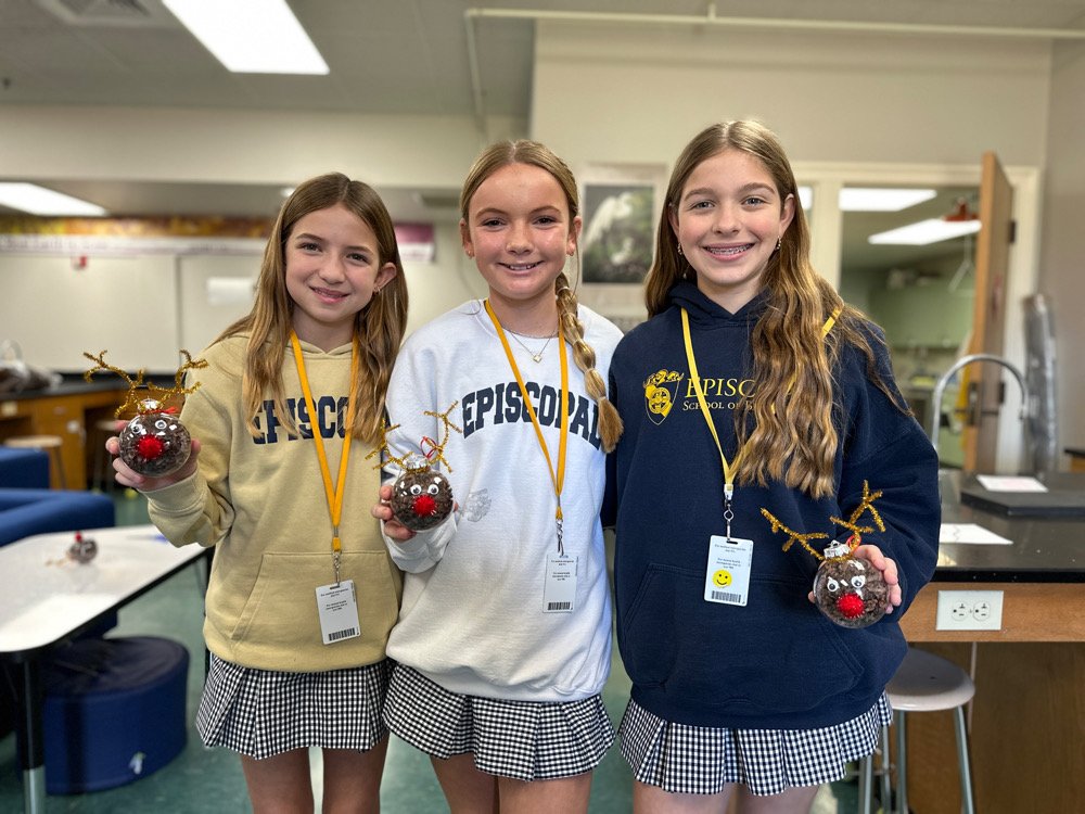Middle School students with reindeer ornaments